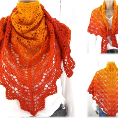 Picture of a crochet shawl in orange and red hues